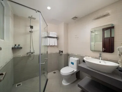Quadruple Room with Balcony — Valoria Premium Hanoi Hotel and Travel
